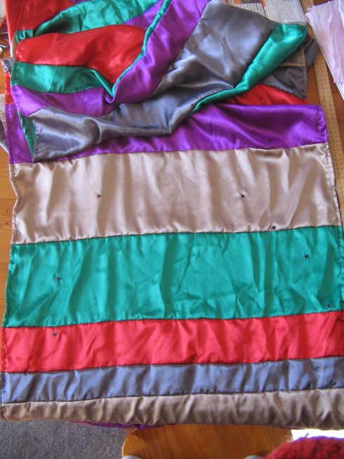 Part of my striped scarf dress, showing the snaps that convert a rectangle into a me-shaped dress