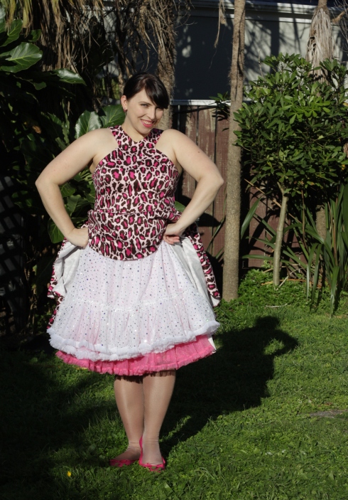 Not an apron, but my white sparkly petticoat, layered over a locally made pink one.